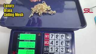 Dekoracja sufitowa z mosiężnej siatki pierścieniowej